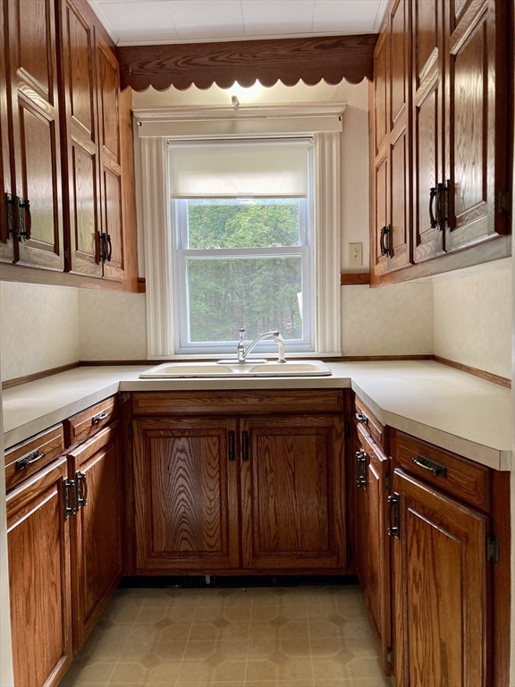 124 Bailey Road Holden, MA 01520 - Photo 9 of 37 a kitchen with a sink and a window