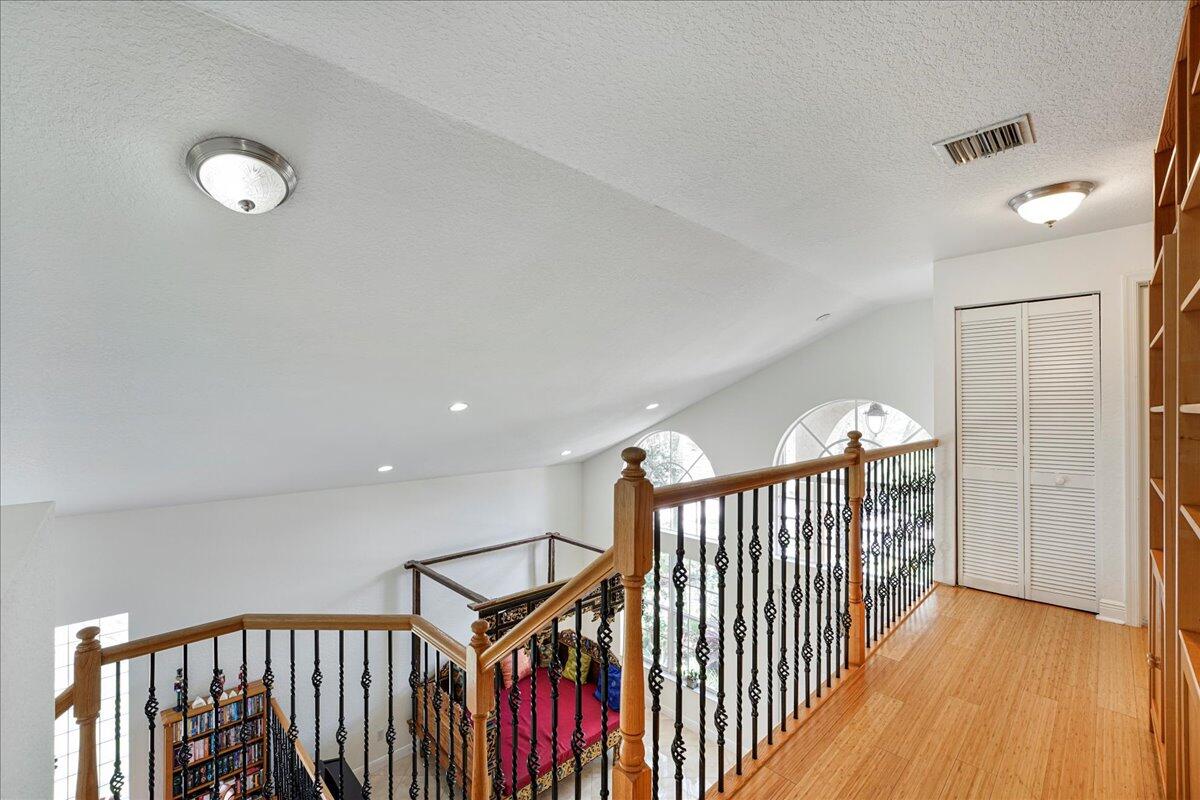 19059 Skyridge Circle Boca Raton, FL 33498 - Photo 20 of 40 a view of a hallway with wooden floor