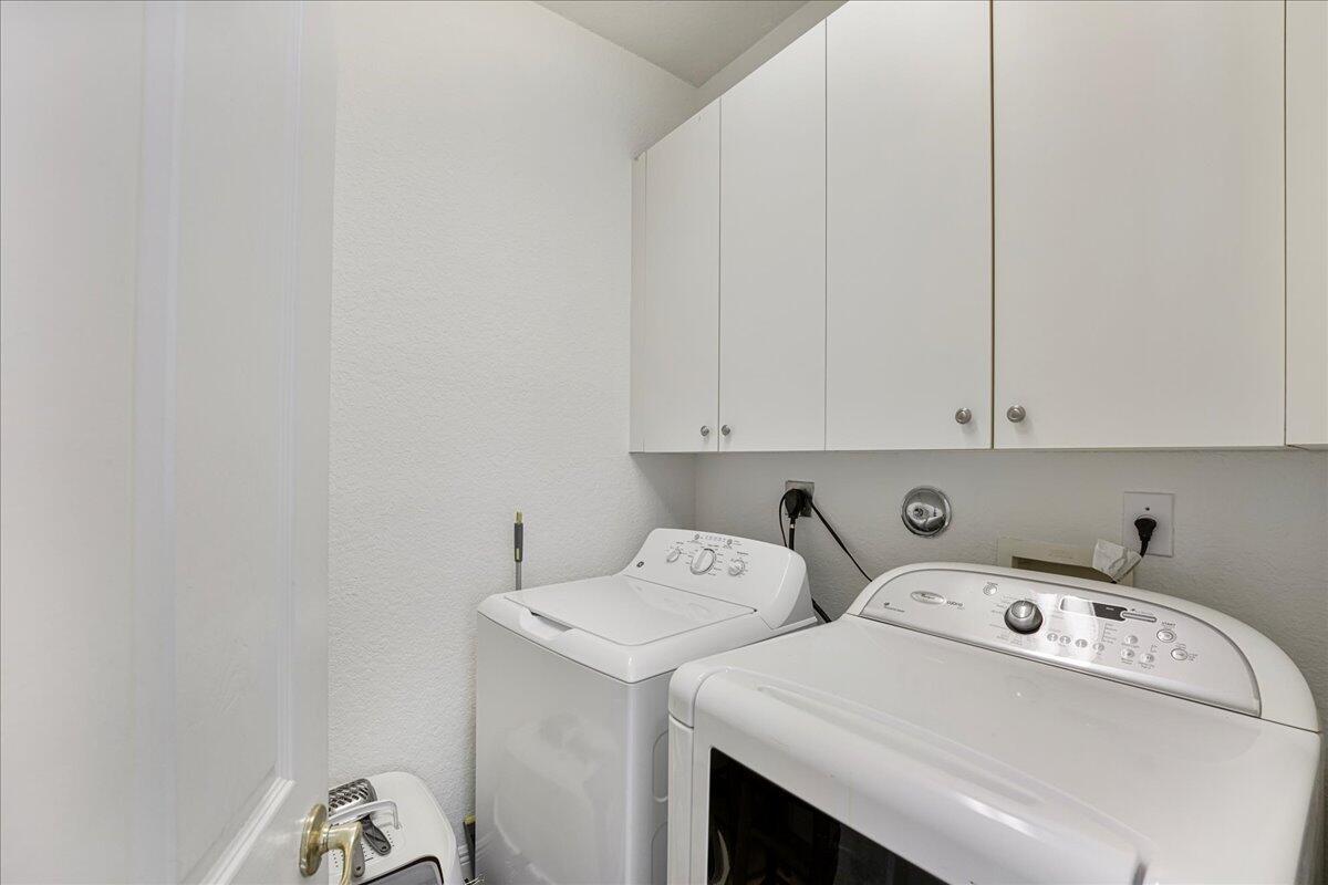 19059 Skyridge Circle Boca Raton, FL 33498 - Photo 34 of 40 a utility room with dryer and washer