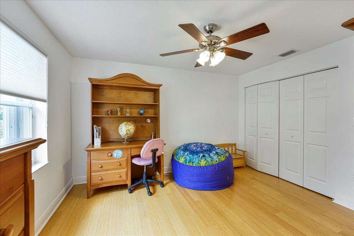 19059 Skyridge Circle Boca Raton, FL 33498 - Photo 36 of 40 a bed room with a bed and a window