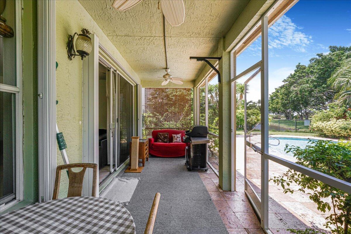 19059 Skyridge Circle Boca Raton, FL 33498 - Photo 39 of 40 a building outdoor space with seating