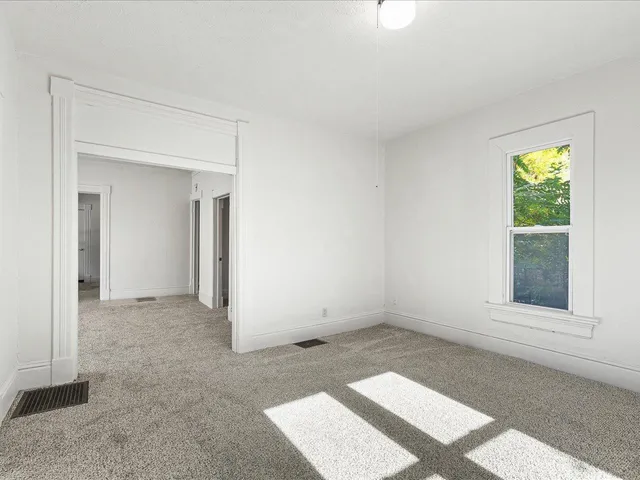 an empty room with windows