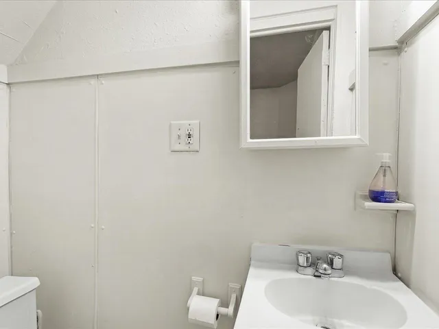 a bathroom with a sink and a toilet