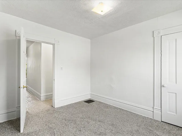 an empty room with closet
