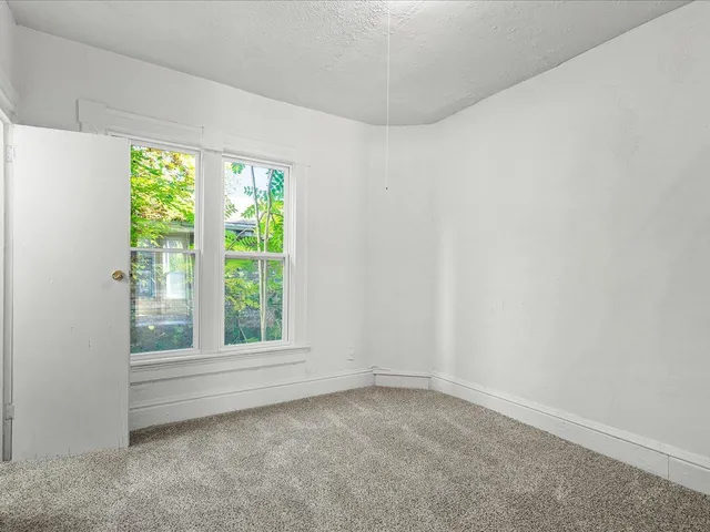 an empty room with a window