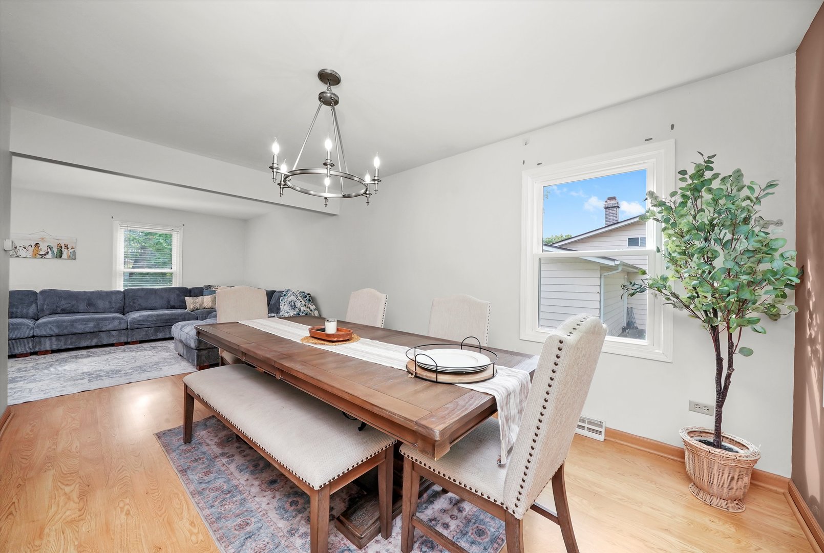 41 Lockman Circle Elgin, IL 60123 - Photo 11 of 46 a view of a dining room with furniture and a chandelier