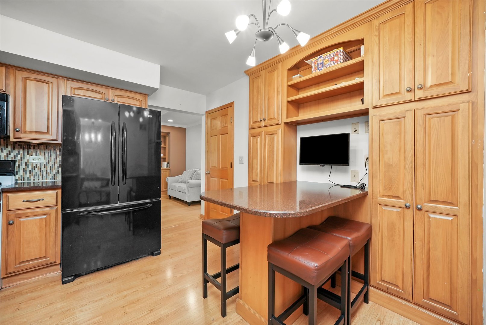 41 Lockman Circle Elgin, IL 60123 - Photo 7 of 46 a kitchen with stainless steel appliances granite countertop a refrigerator and a sink