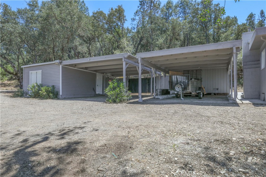 15905 Kugelman Street Lower Lake, CA 95457 - Photo 9 of 75 a view of a house with a yard