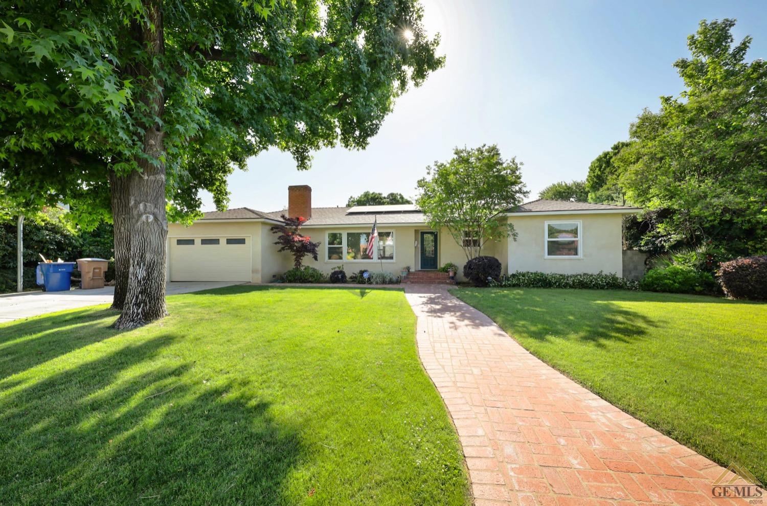 a house view with a garden space