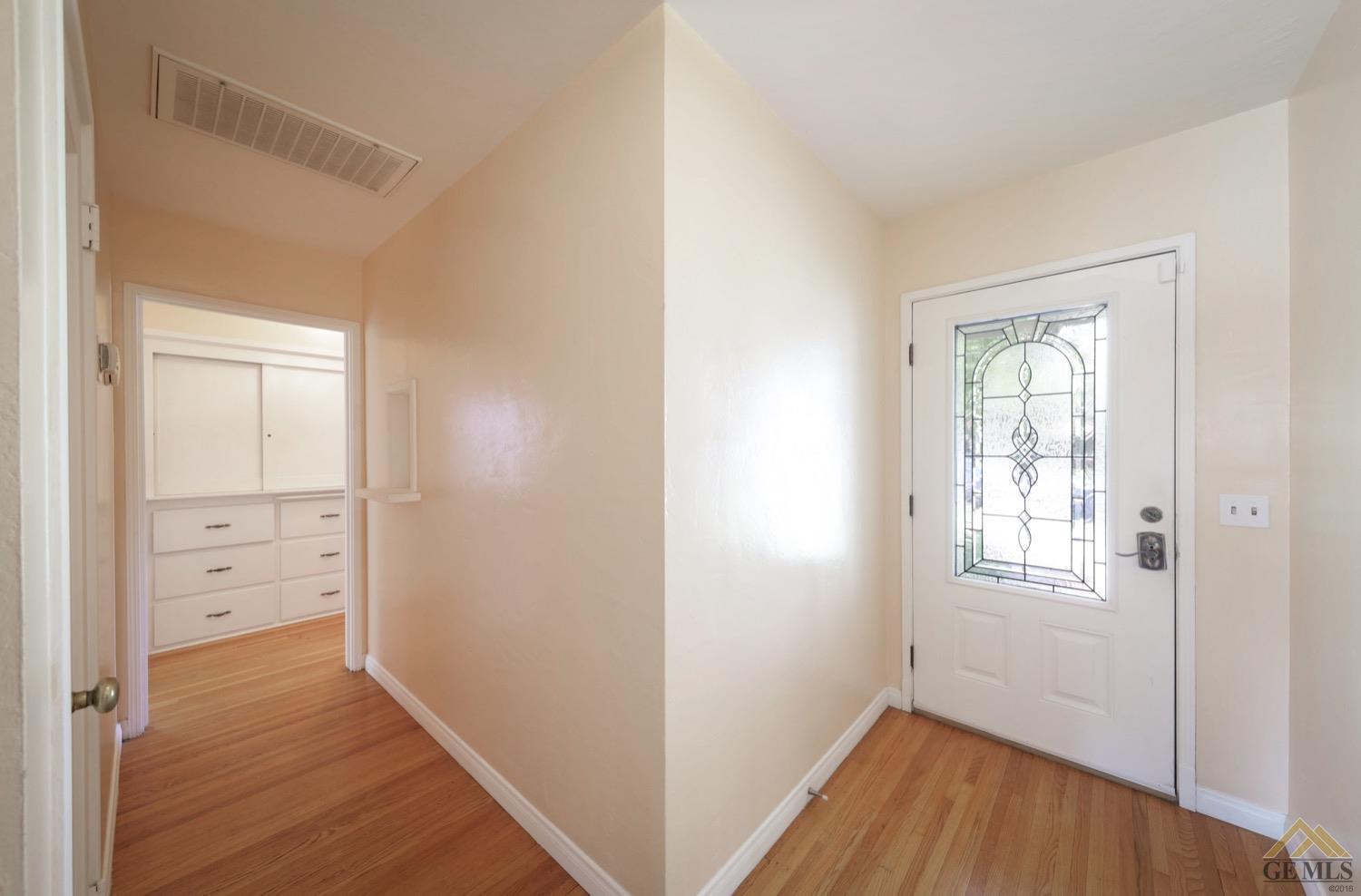 Undisclosed Address Bakersfield, CA 93308 - Photo 5 of 22 an empty room with windows and closet