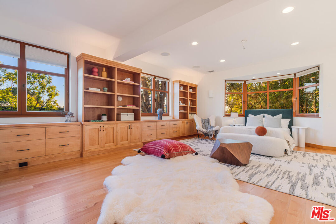 2232 Stradella Road Los Angeles, CA 90077 - Photo 22 of 48 a bedroom with furniture and window
