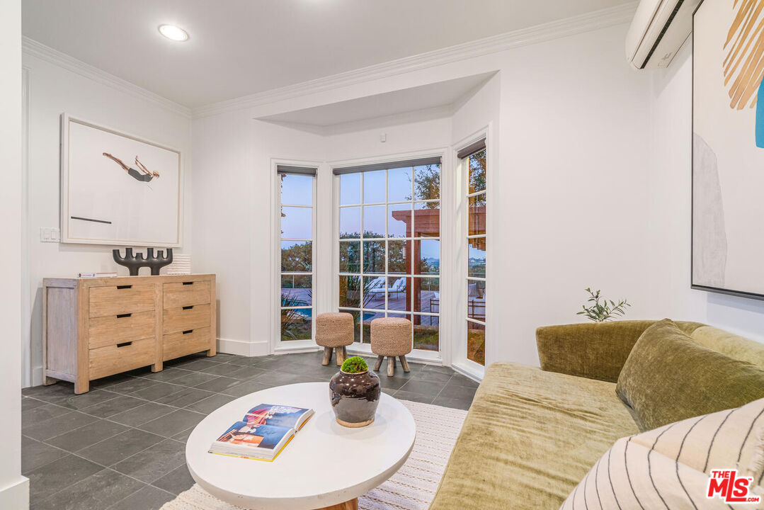 2232 Stradella Road Los Angeles, CA 90077 - Photo 33 of 48 a bed room with a bed and a chair