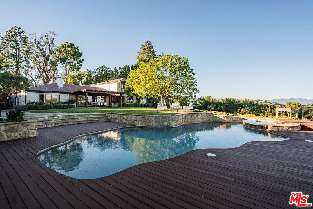 2232 Stradella Road Los Angeles, CA 90077 - Photo 34 of 48 a view of a lake with sitting area