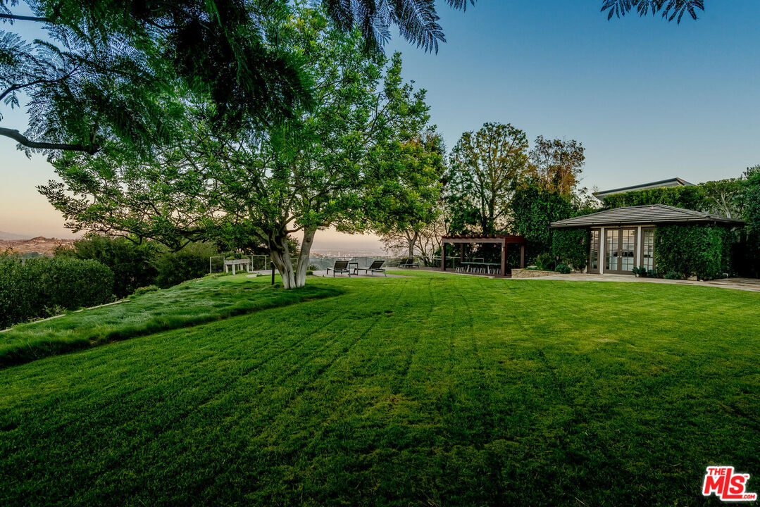 2232 Stradella Road Los Angeles, CA 90077 - Photo 4 of 4 a view of house with a backyard