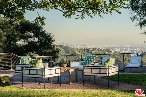 a view of a terrace with couches and a table