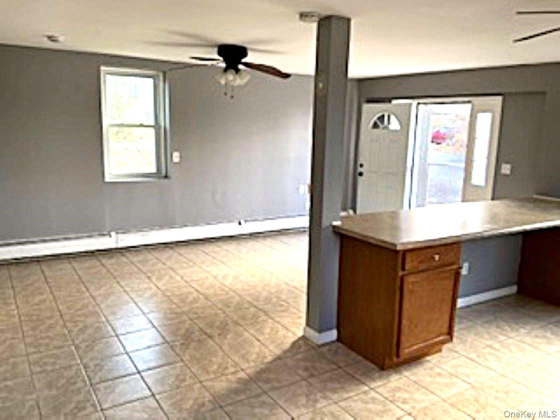 178 Pine Tree Road Monroe, NY 10950 - Photo 4 of 11 a room with a large window