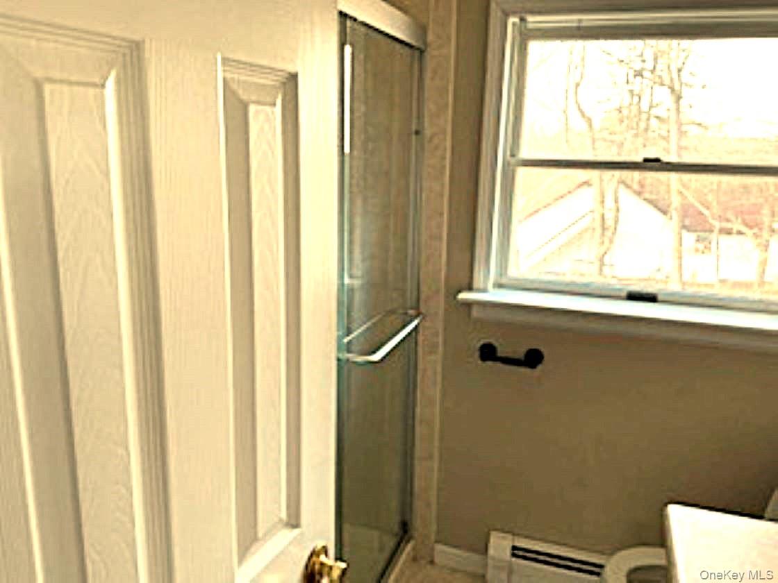 178 Pine Tree Road Monroe, NY 10950 - Photo 10 of 11 a bathroom with a window