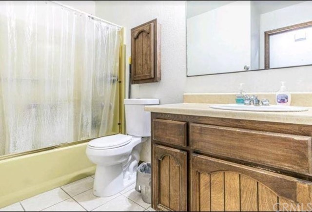 Undisclosed Address Hesperia, CA 92345 - Photo 6 of 14 a bathroom with a sink toilet and shower