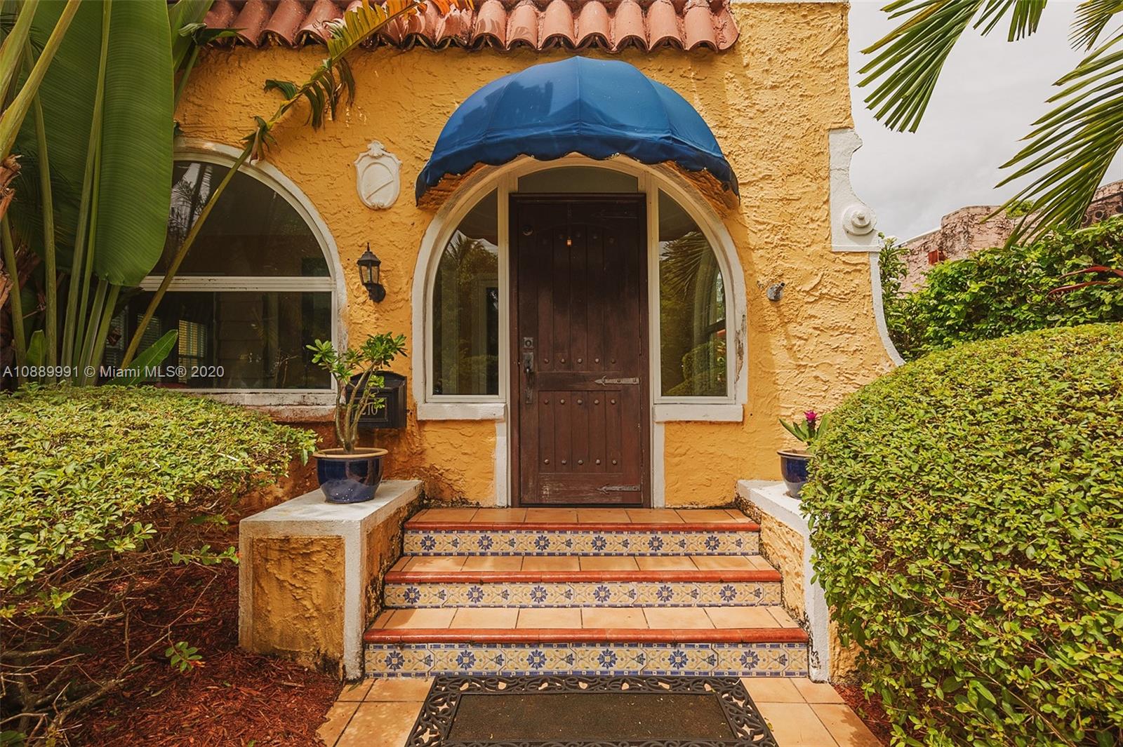 210 Southwest 19th Road Miami, FL 33129 - Photo 11 of 33 a front view of a house with garden