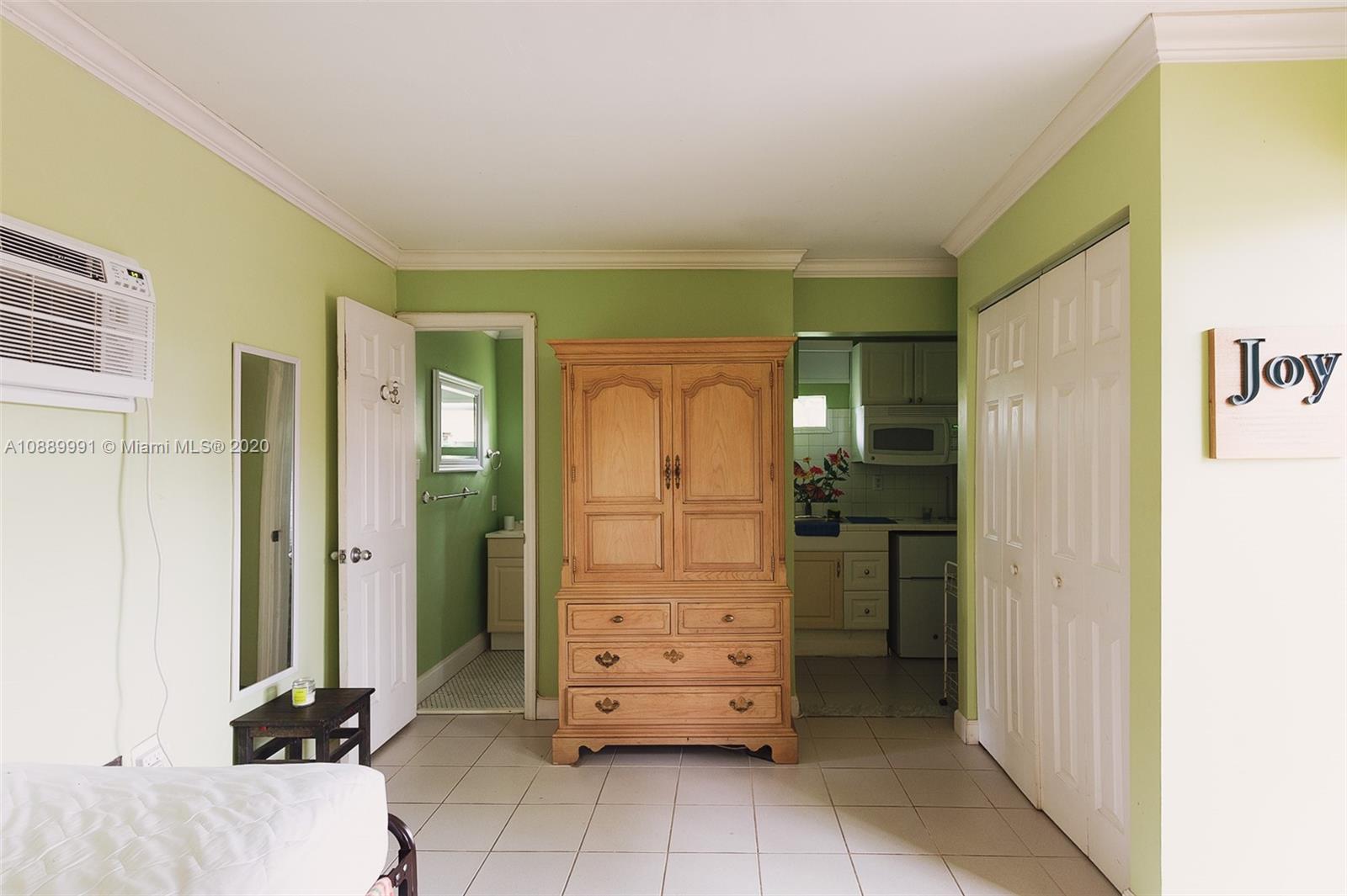 210 Southwest 19th Road Miami, FL 33129 - Photo 24 of 33 a bathroom with a shower and a sink