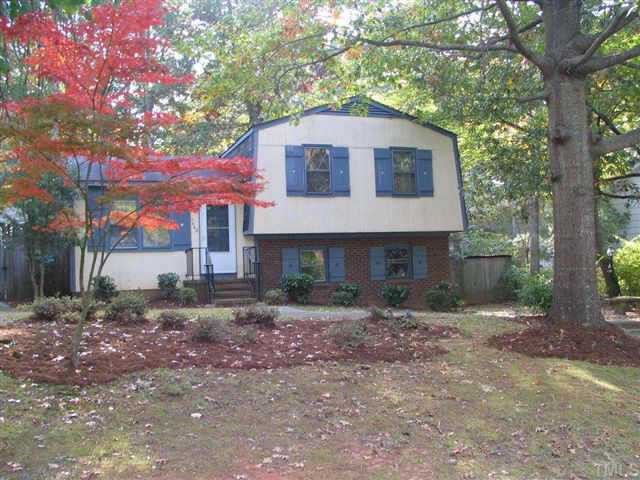 7640 Mine Valley Court Raleigh, NC 27615 - Photo 1 of 1 a front view of a house with a yard and garage