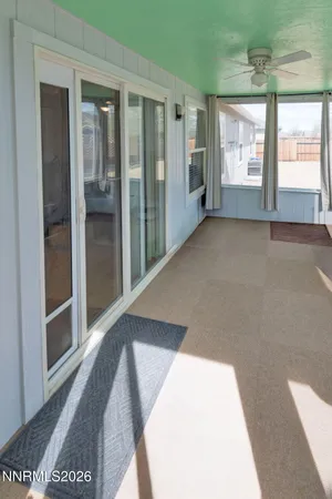 a view of hallway with windows
