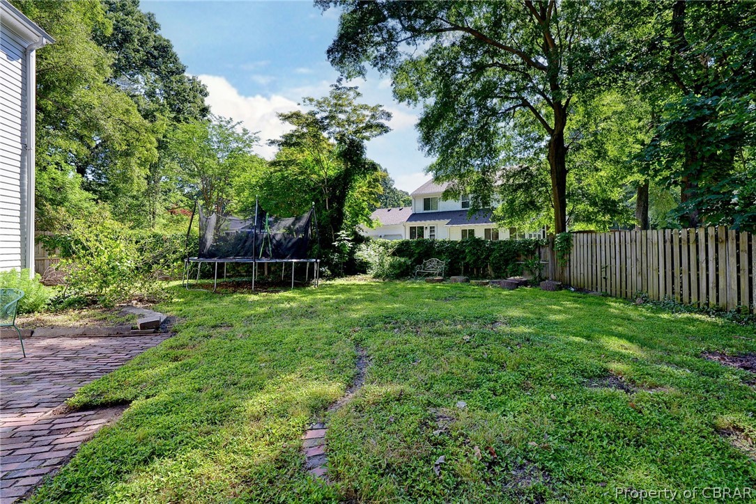 137 Wilderness Road Hampton, VA 23669 - Photo 27 of 45 View of yard with a trampoline