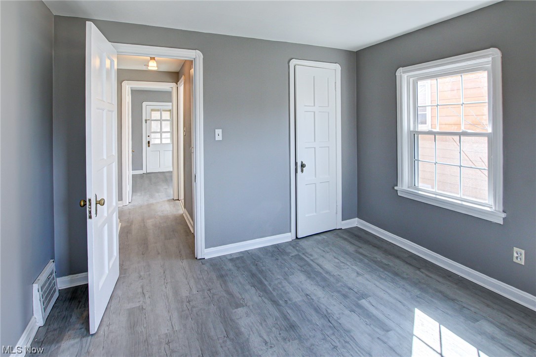 3423 Westbury Road Cleveland, OH 44120 - Photo 14 of 38 Unfurnished bedroom featuring a closet and light hardwood / wood-style floors