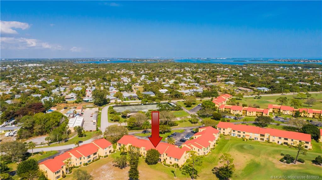 5313 Southeast Miles Grant Road, Unit K209 Stuart, FL 34997 - Photo 3 of 20 a view of city and ocean