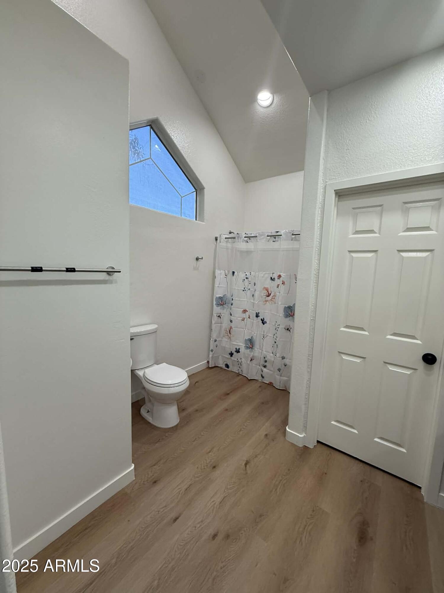 1633 East Lakeside Drive, Unit 65 Gilbert, AZ 85234 - Photo 8 of 12 a bathroom with a toilet