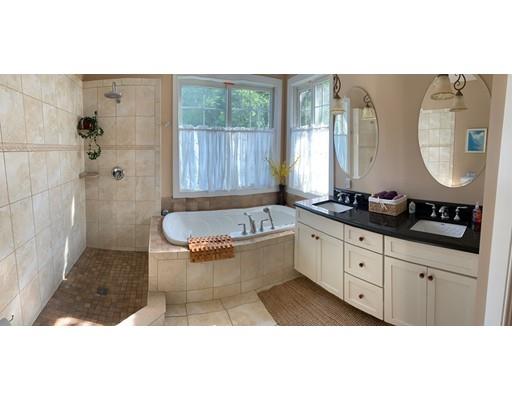 29 Beach Road Ware, MA 01082 - Photo 22 of 42 a spacious bathroom with a tub sink and mirror