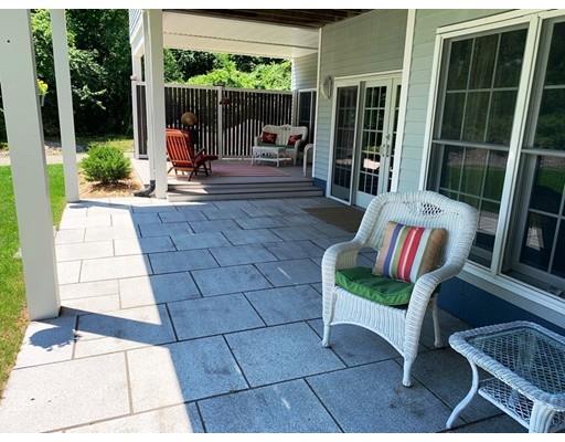 29 Beach Road Ware, MA 01082 - Photo 31 of 42 a building outdoor space with patio furniture and potted plants