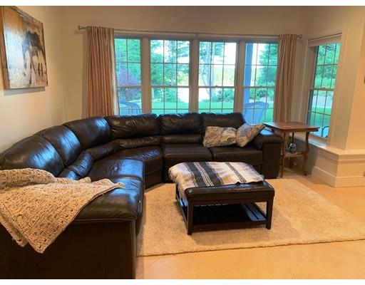 29 Beach Road Ware, MA 01082 - Photo 34 of 42 a living room with furniture and a window