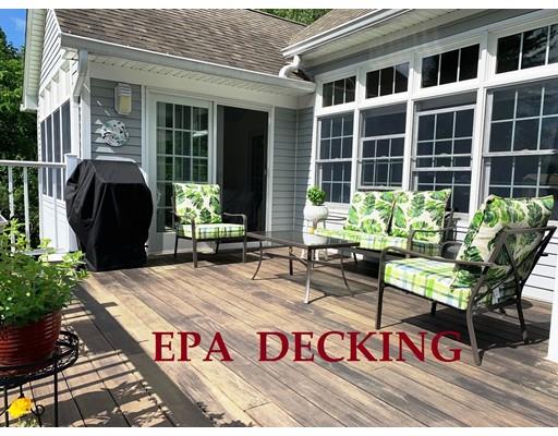 29 Beach Road Ware, MA 01082 - Photo 6 of 42 a front view of a house with outdoor seating