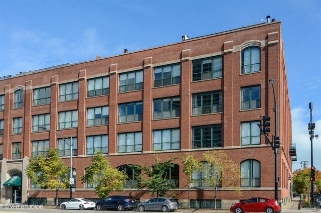 a front view of a building with street view