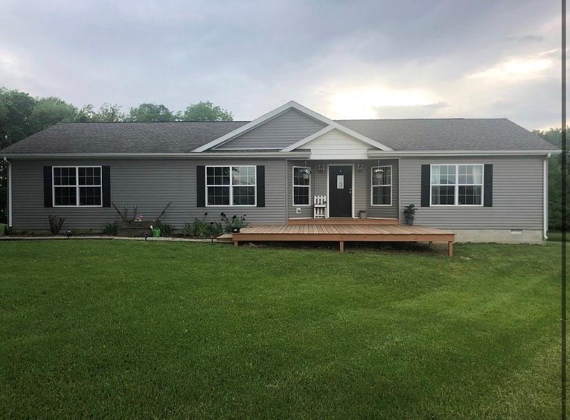 2950 Highway 32 Covington, IN 47932 - Photo 1 of 1 a front view of house with yard and green space
