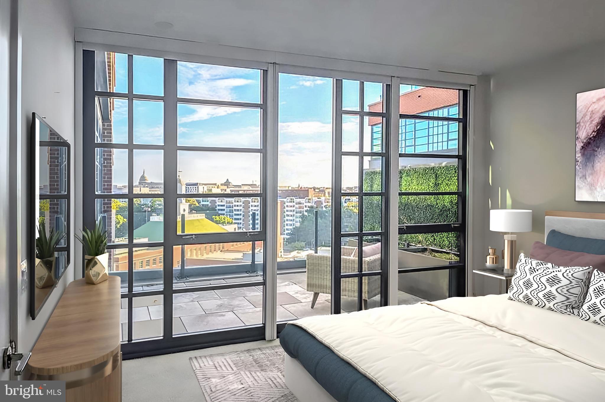 45 Sutton Square Southwest, Unit 1118 Washington, DC 20024 - Photo 22 of 63 Primary BR Wall of floor-to-ceiling windows
