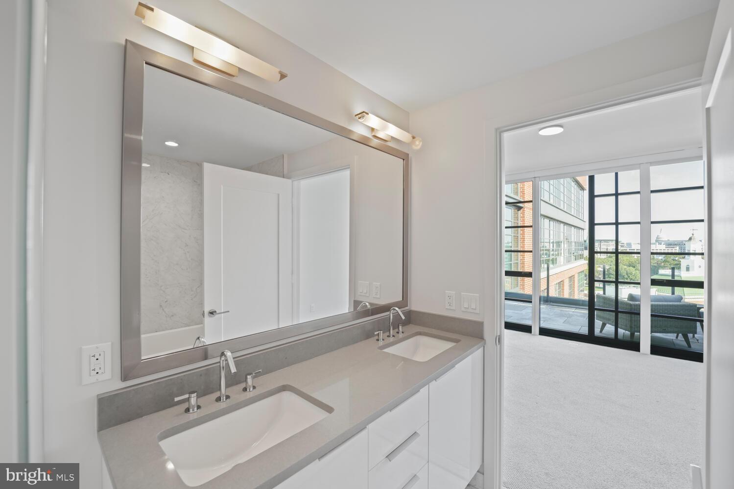 45 Sutton Square Southwest, Unit 1118 Washington, DC 20024 - Photo 25 of 63 Primary ensuite bath w/double Porcelanosa vanity