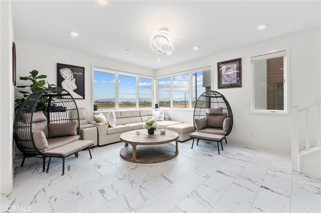 243 Waypoint Tustin, CA 92782 - Photo 4 of 27 Spacious Living Room wiht obstructive view