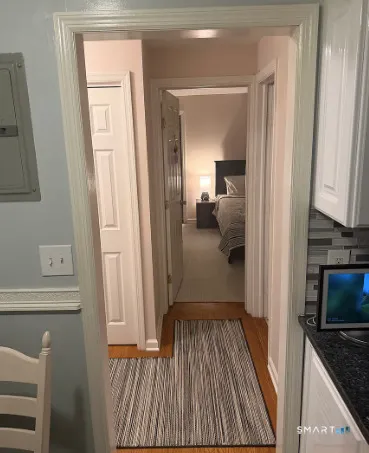 a view of a bedroom from hallway