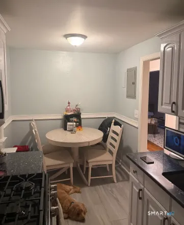 a view of a dining room with furniture