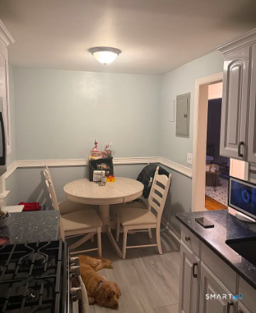 186 Seaton Road, Unit 2 Stamford, CT 06902 - Photo 2 of 14 a view of a dining room with furniture