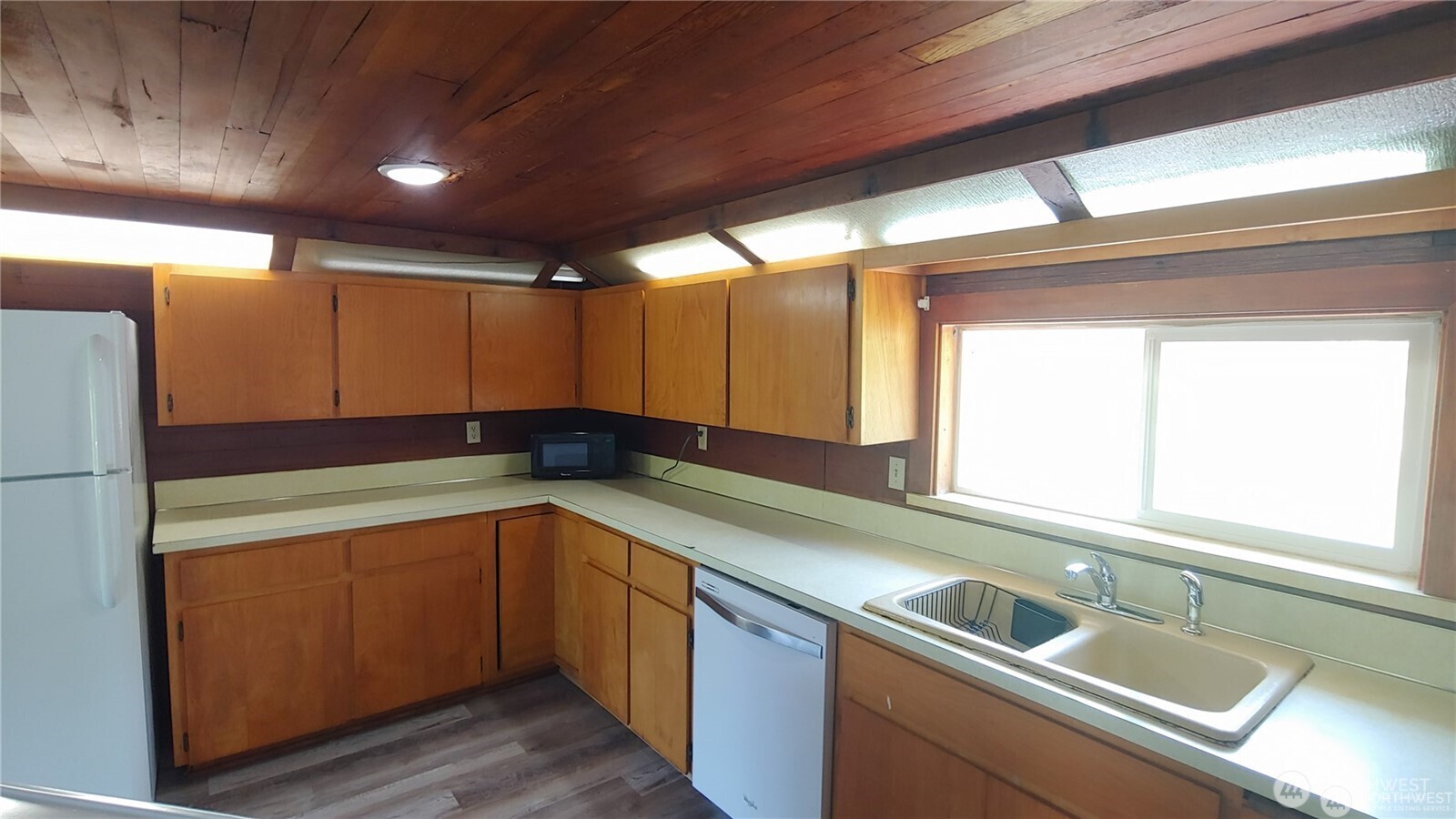 664 Rhoades Road Winlock, WA 98596 - Photo 22 of 26 a kitchen with a sink and cabinets