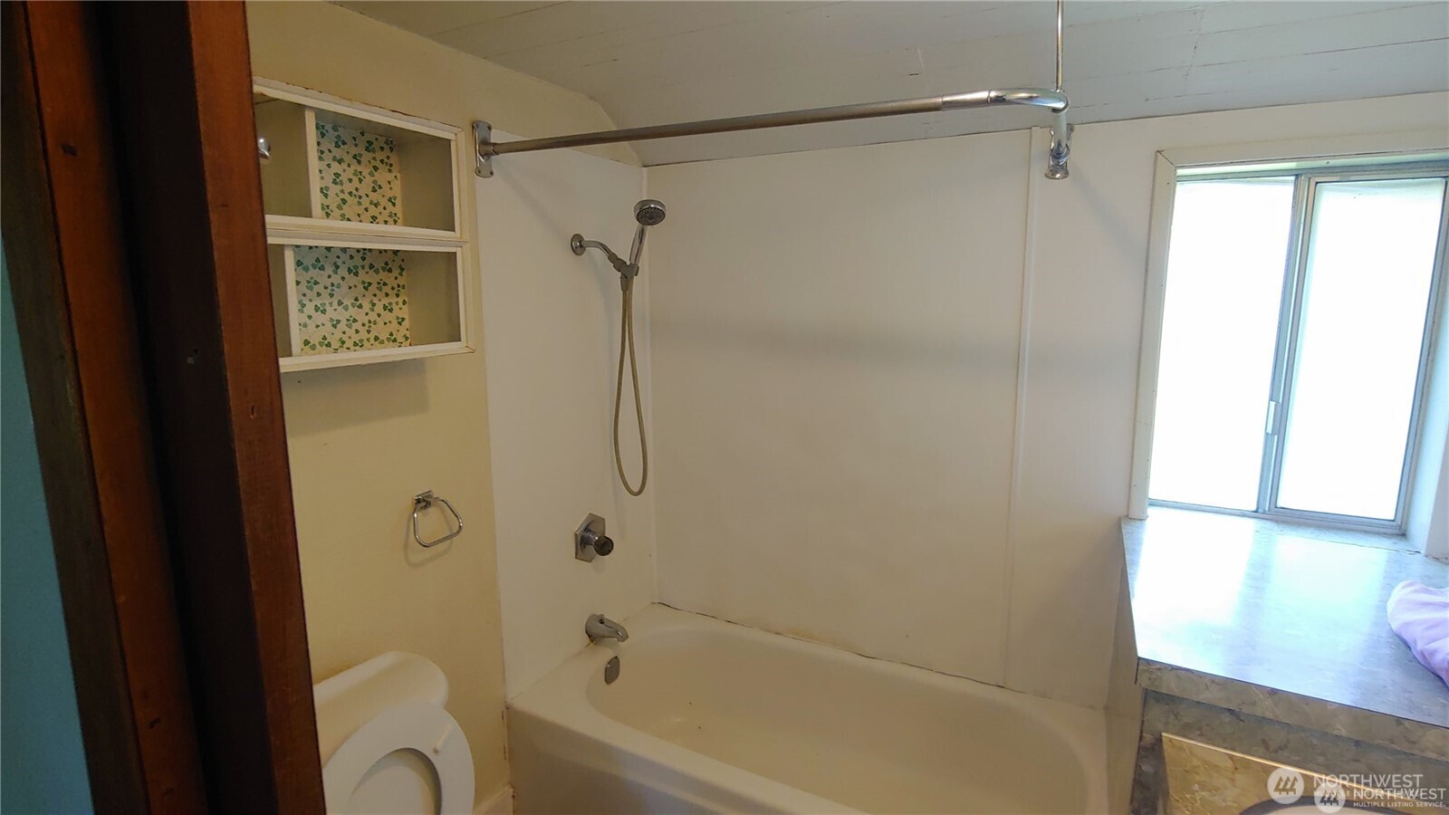 664 Rhoades Road Winlock, WA 98596 - Photo 26 of 26 a bathroom with a shower and a bathtub