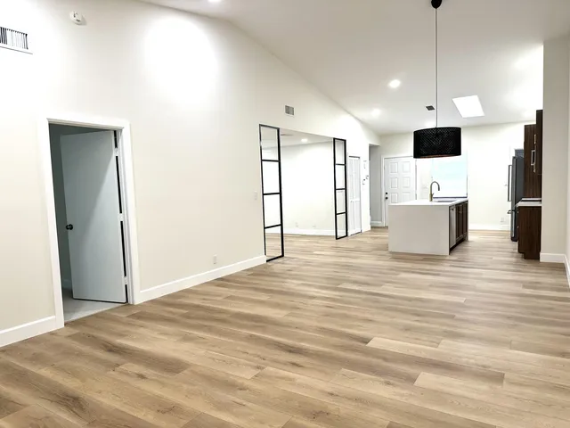 an empty room with windows