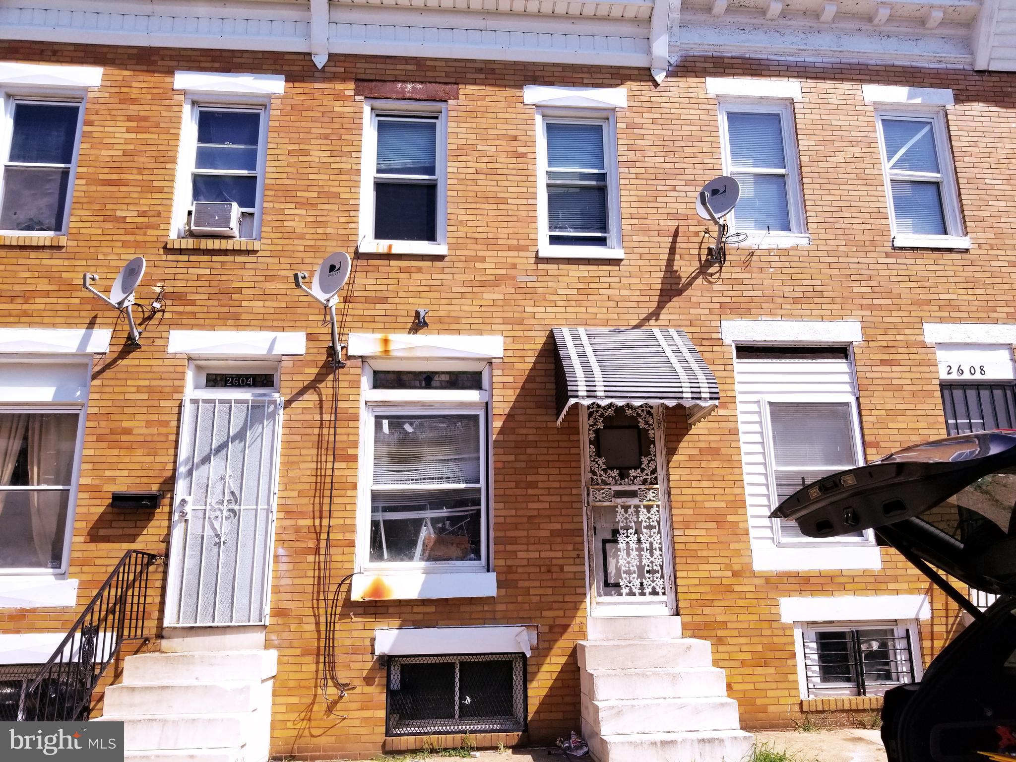 a front view of a multi story residential apartment building