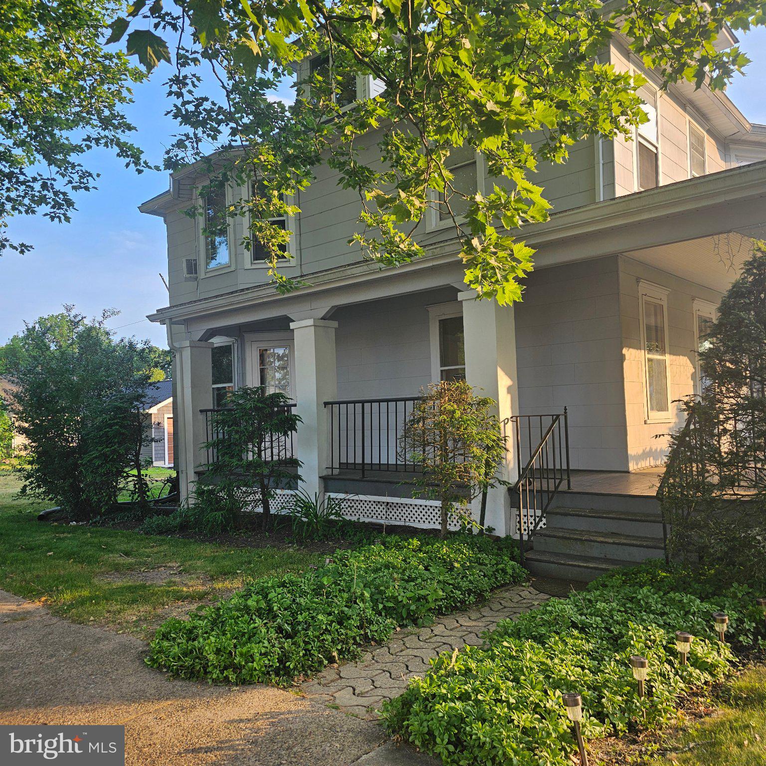 2635 Nottingham Way, Unit 1 Hamilton, NJ 08619 - Photo 2 of 10 Charming home with lush greenery.
