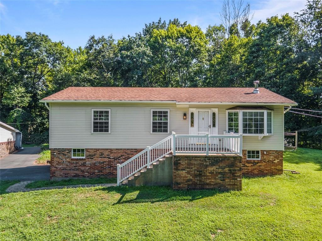 366 Claytonia Road Slippery Rock, PA 16057 - Photo 1 of 38 a view of a house with a yard and sitting area
