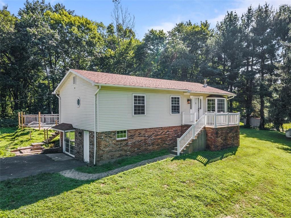 366 Claytonia Road Slippery Rock, PA 16057 - Photo 3 of 38 a view of house with backyard and pool