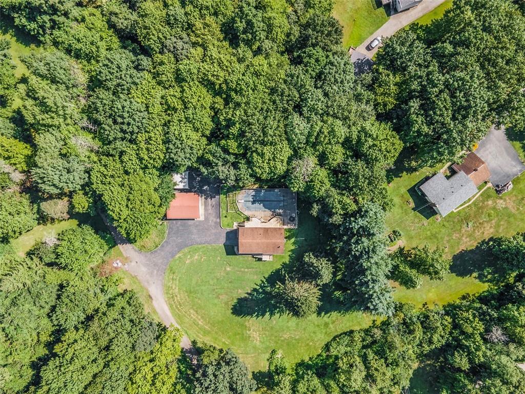 366 Claytonia Road Slippery Rock, PA 16057 - Photo 36 of 38 an aerial view of a house with a yard and greenery